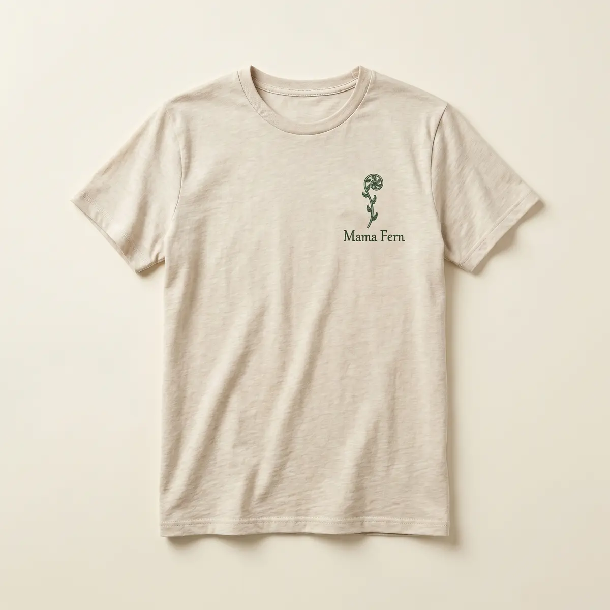 Mama Fern tee in natural cotton with a green fern design